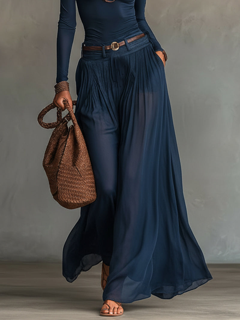 Set of two pieces: asymmetric navy blue top and transparent tulle skirt (with belt)