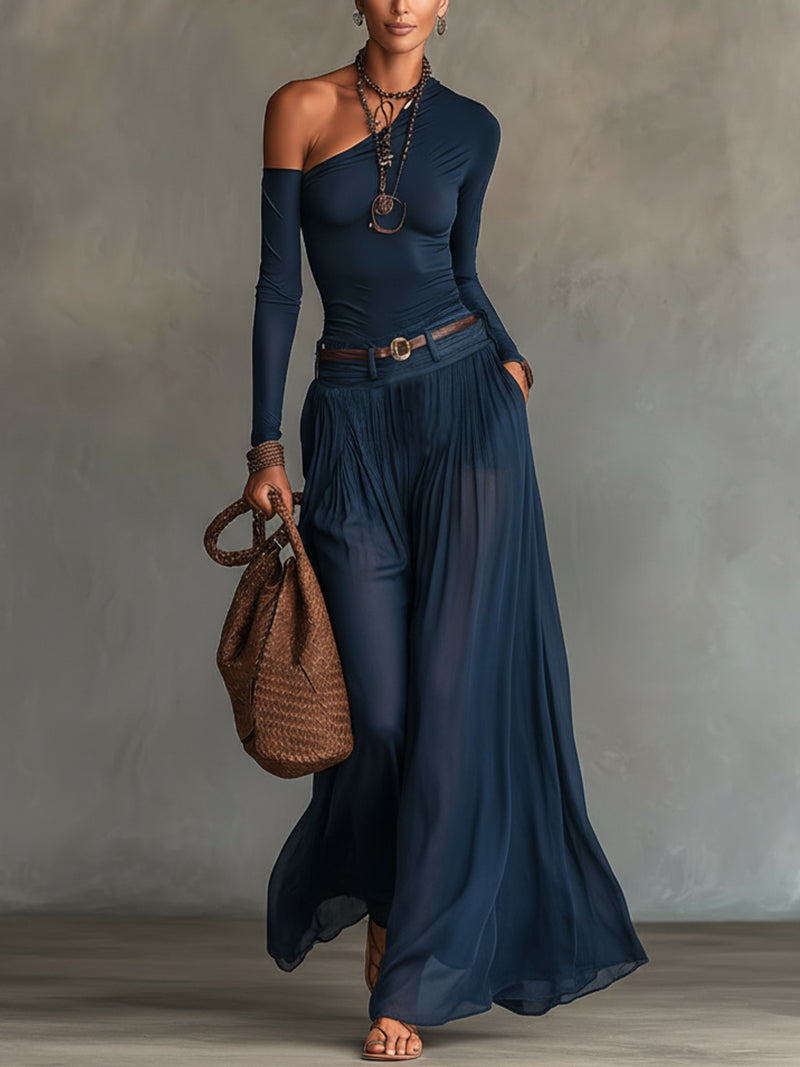 Set of two pieces: asymmetric navy blue top and transparent tulle skirt (with belt)